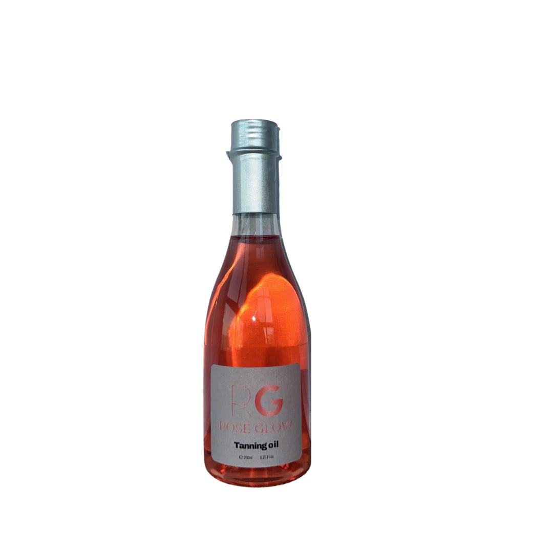 Rosé Glow tanning oil bottle—Vitamin E & grapeseed blend for long‑lasting, luminous skin